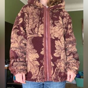 L Urban Outfitters cozy zip-up fleece with elbow detail and hood.